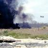 Minefield fire CH 46 in background